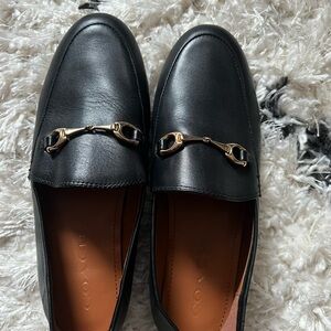 Coach Black Leather Slip-On Loafers with Gold Accents